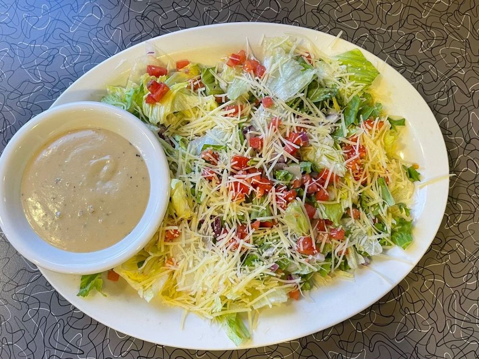 Order Caesar Salad - OO food online from Biscuits Cafe store, Chandler on bringmethat.com