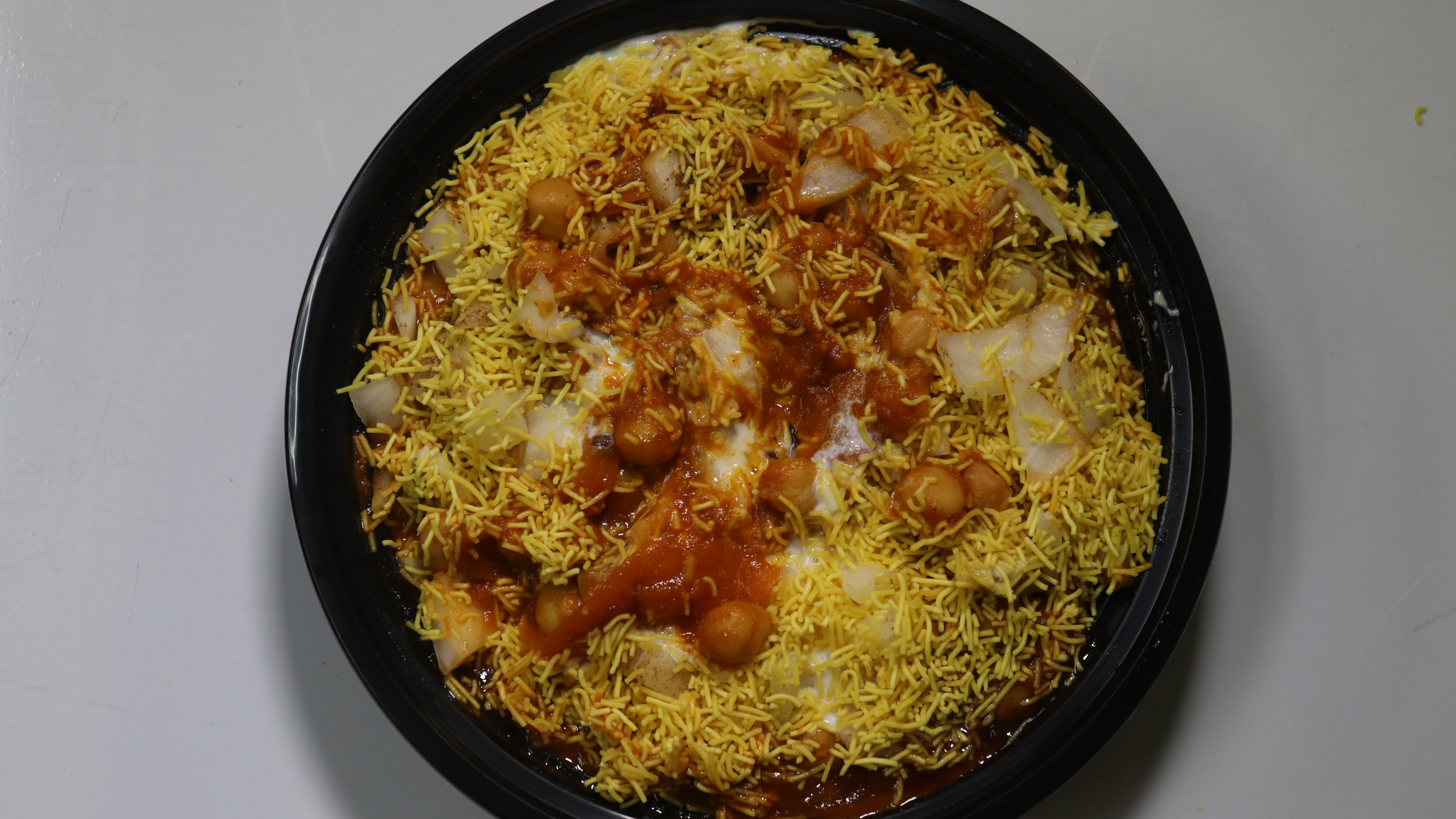 Order Samosa Chaat food online from Hot N Spicy Restaurant store, Irving on bringmethat.com