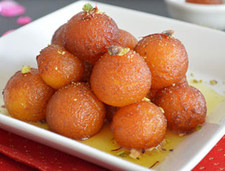 Order Gulab Jamun food online from Priya Indian Cuisine store, Lowell on bringmethat.com