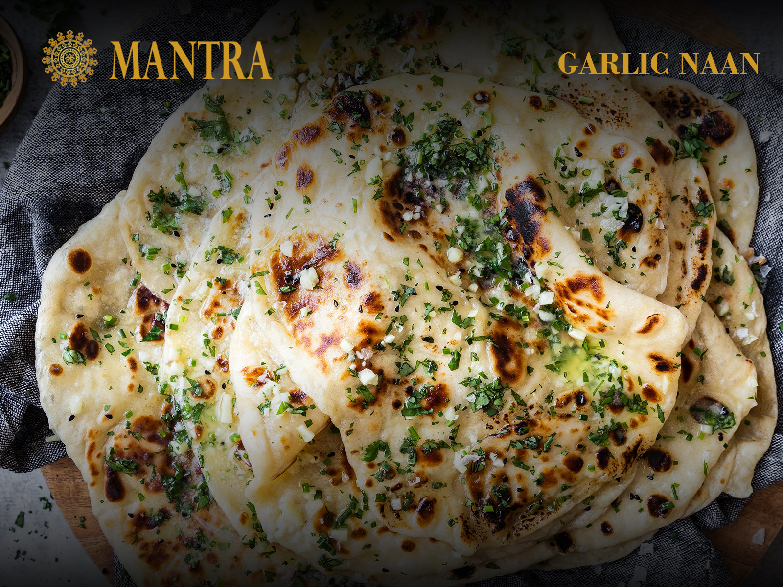 Order Garlic Naan food online from Mantra Authentic Indian Restaurant store, Jersey City on bringmethat.com