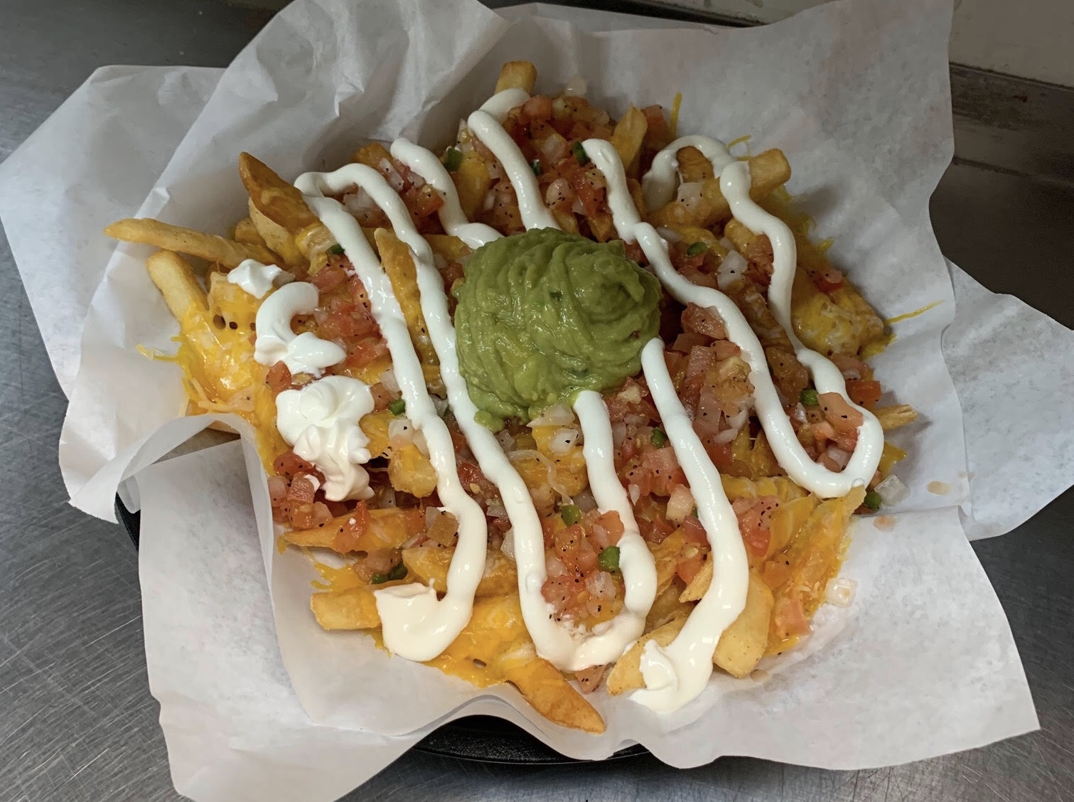 Order Nacho Fries food online from Chino Hills Brewing Co store, Chino Hills on bringmethat.com