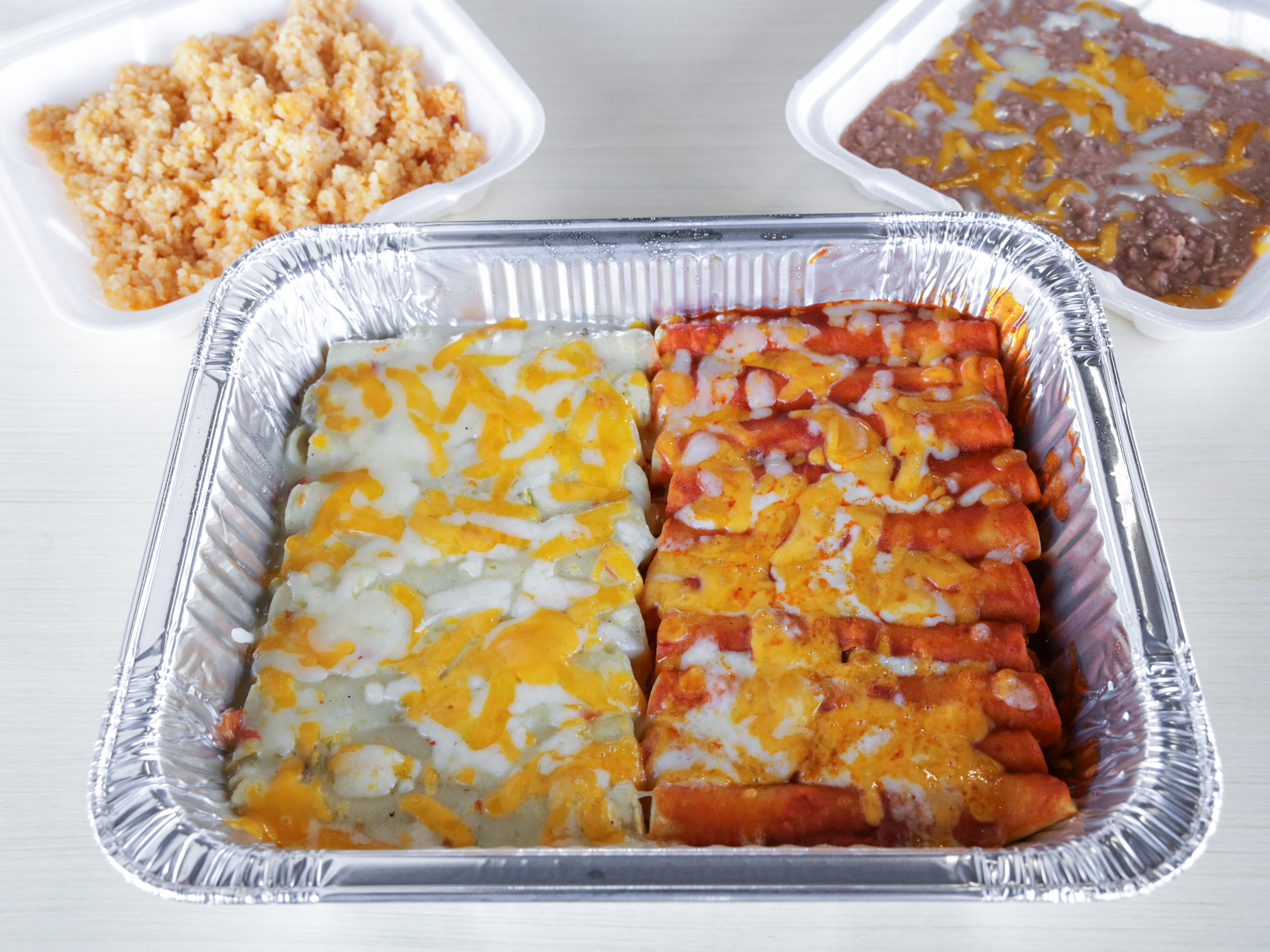 Order Tray of 20 Enchiladas food online from El Toro Bravo Restaurant store, Roswell on bringmethat.com