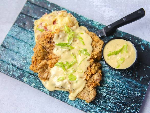 Order TEXAS-SIZED WAGYU CHICKEN FRIED STEAK food online from Black Walnut Cafe store, The Woodlands on bringmethat.com