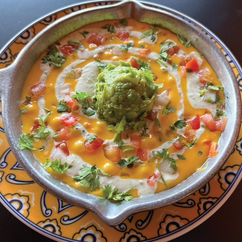 Order Loaded Queso food online from Uncle Julios Fine Mexican Foods store, Grapevine on bringmethat.com