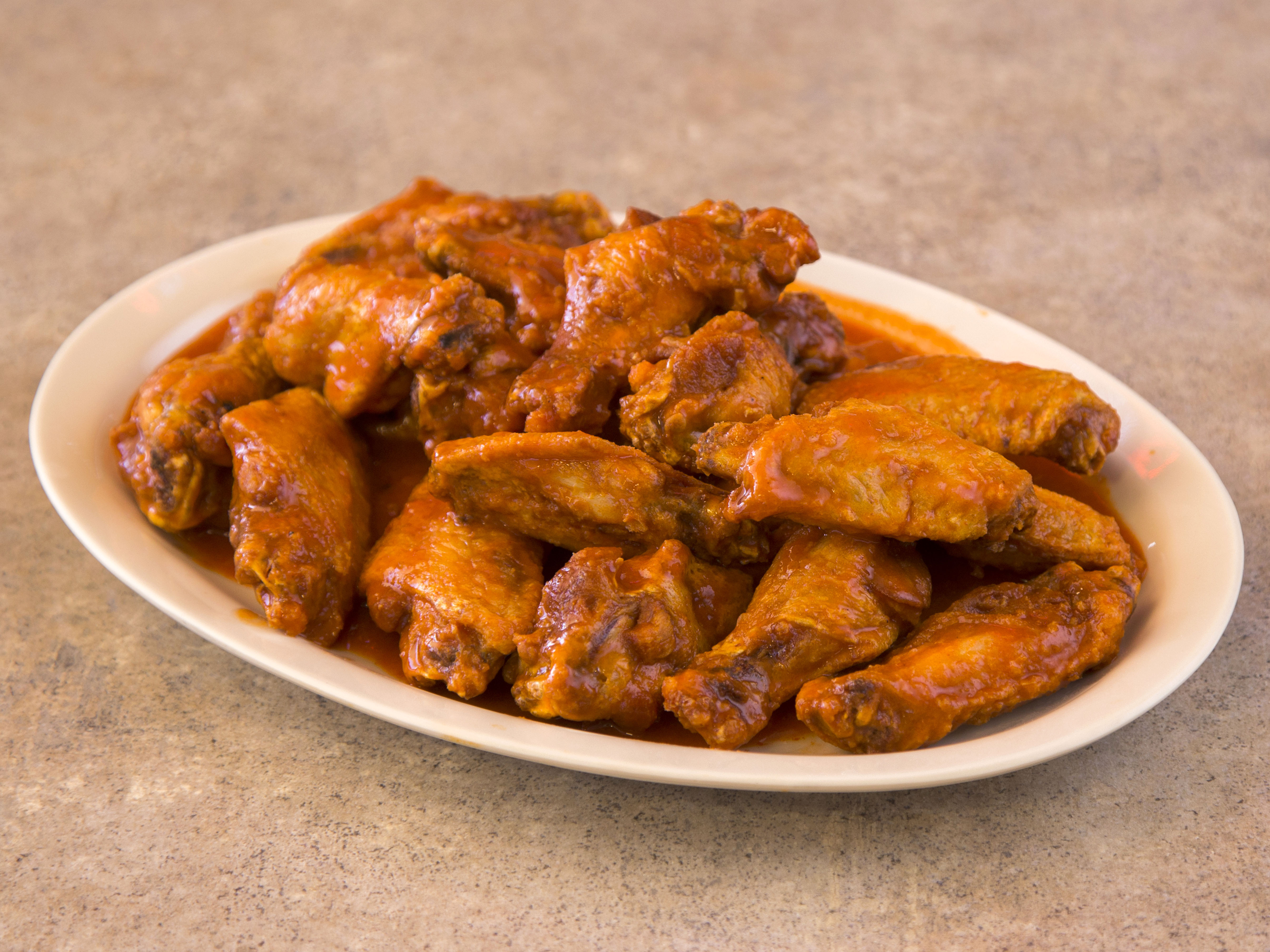Order Chicken Wings food online from Famous Ray's Pizza store, Glendale on bringmethat.com