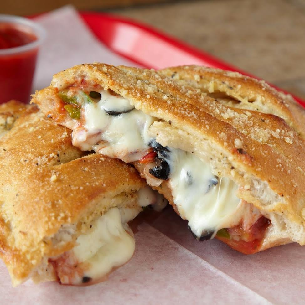 Order The Works Calzone Wrap food online from Papa Ray's Pizza & Wings store, Carol Stream on bringmethat.com