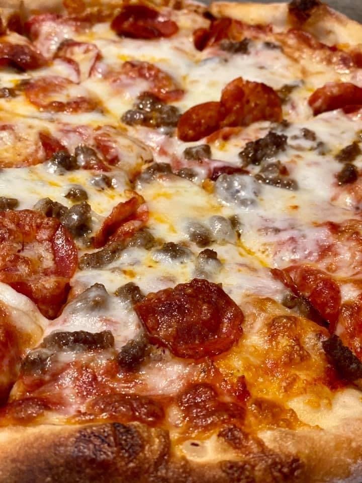 Order Meat Deluxe Pizza - Personal 10" food online from Black Bear Pizza store, Asheville on bringmethat.com