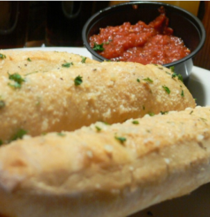 Order  Flo's Breadstick food online from Flo Pizzeria store, Grand Rapids on bringmethat.com