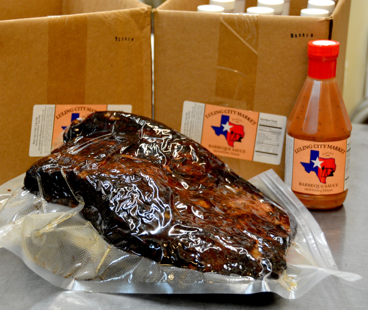 Order Whole Brisket with 1 Bottle of Sauce food online from luling City Market store, Houston on bringmethat.com
