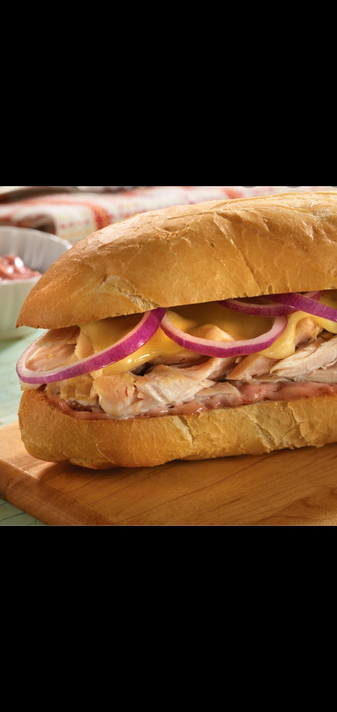 Order Hot Boar's Head Oven Gold Turkey & Brie Cheese  Red Onions Sandwich  food online from American Gourmet Foods Deli store, New York on bringmethat.com