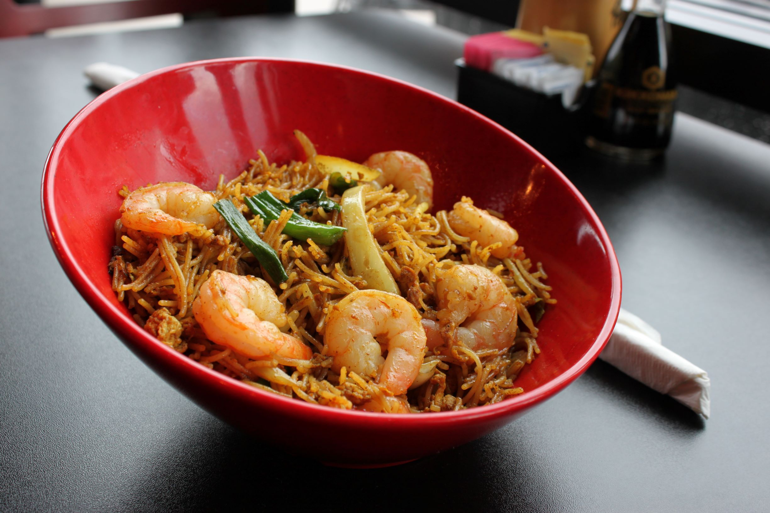 Order Singapore Noodles food online from Bamboo Bistro Westgate store, Austin on bringmethat.com