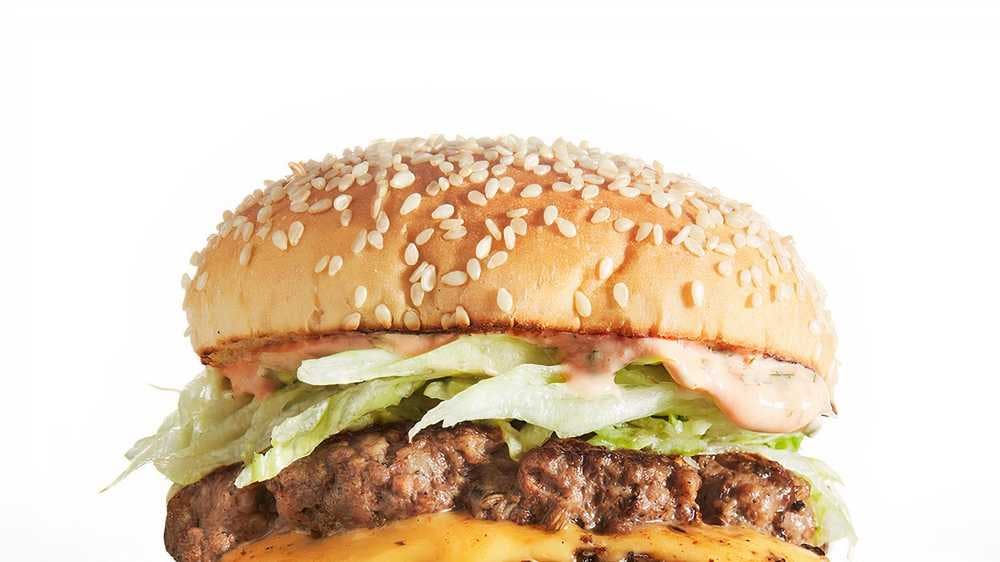 Order 33.Double Cheeseburger - Burger food online from Super Kennedy Chicken store, Bronx on bringmethat.com