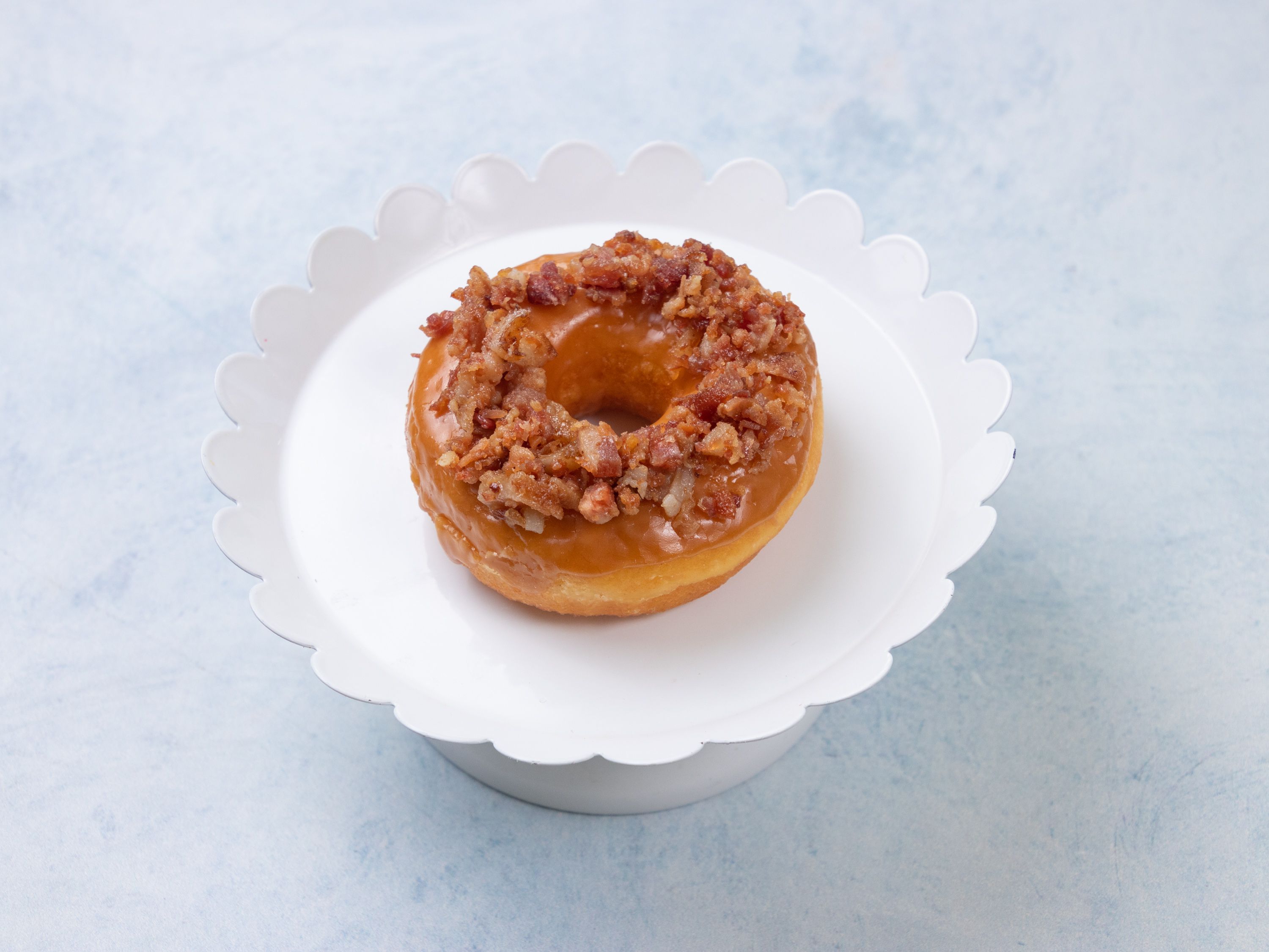 Order Maple Bacon Donut food online from Joy Donuts store, Dacula on bringmethat.com