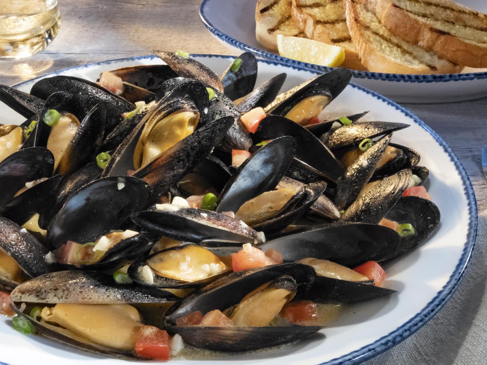 Order White Wine And Roasted-garlic Mussels food online from Red Lobster store, San Bruno on bringmethat.com