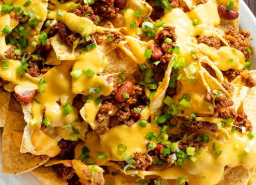 Order Nachos with Queso  food online from Harrys Daiquiri store, Houston on bringmethat.com