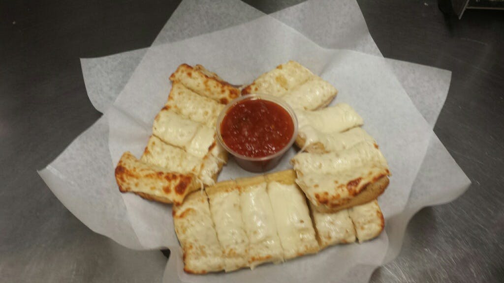 Order Garlic Bread - 12 Pieces food online from Pizzeria Ora Chicago store, Chicago on bringmethat.com
