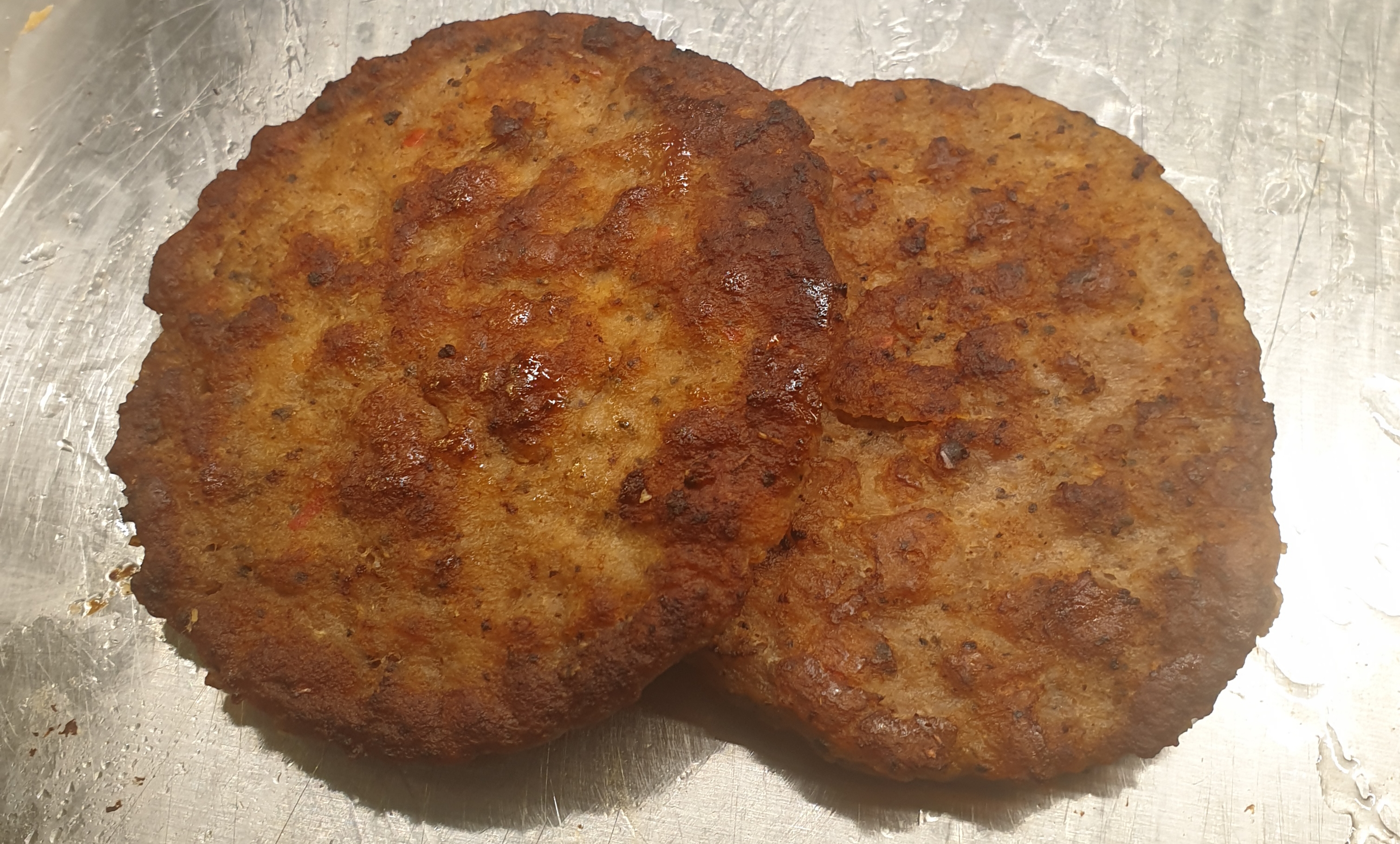 Order Pork Sausage Patties (2 pieces) food online from Taz Cafe store, New York on bringmethat.com