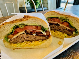 Order X Calabresa Burger food online from Pao De Queijo store, Astoria on bringmethat.com