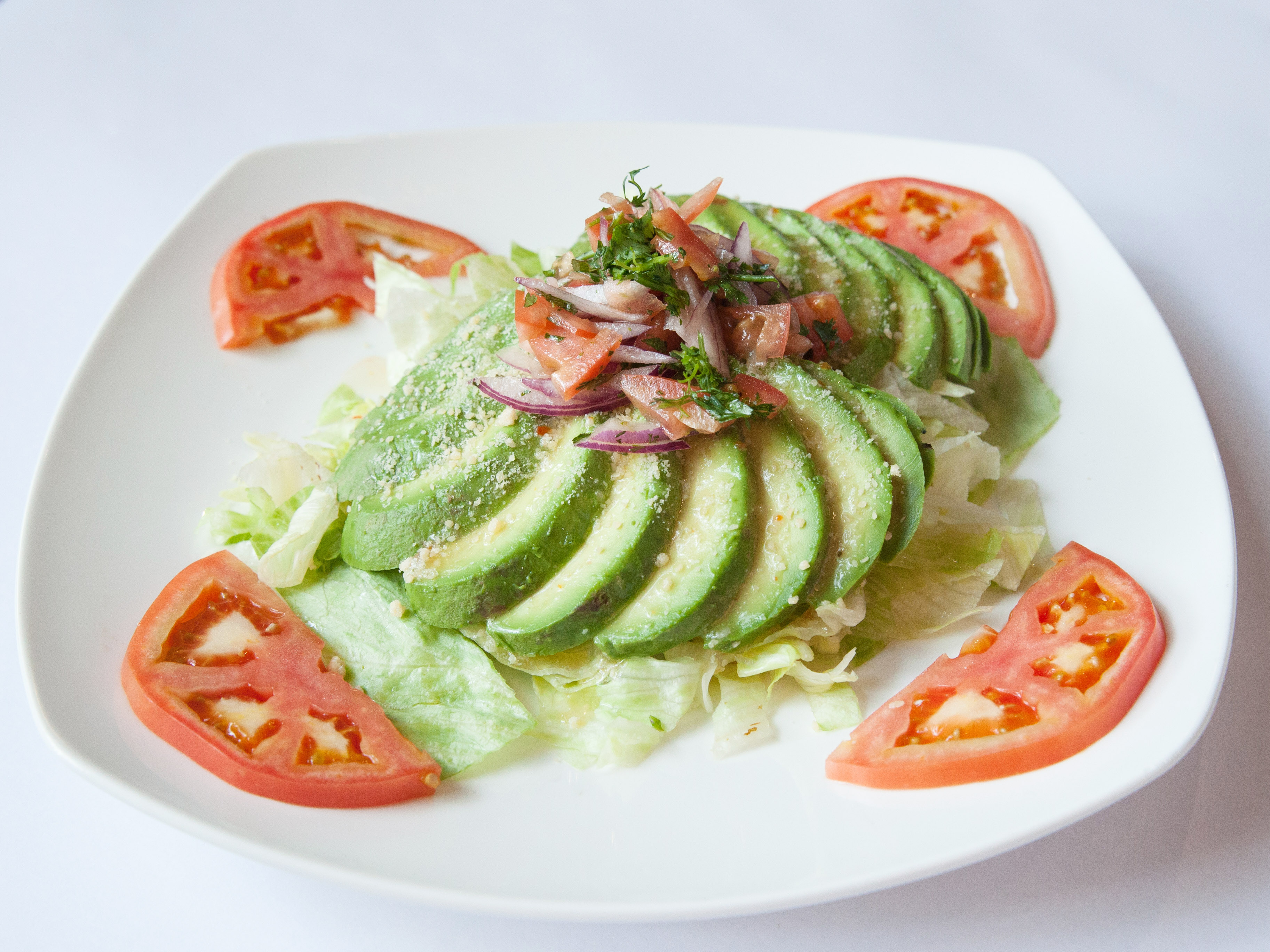 Order Ensalada de Aguacate food online from Barzola restaurant iii store, Jackson Heights on bringmethat.com