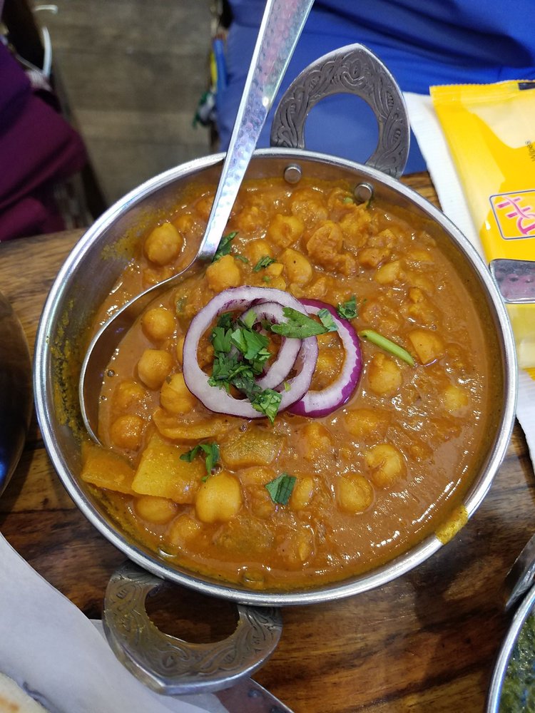 Order Channa Masala food online from Mughlai Indian Cuisine store, New York on bringmethat.com
