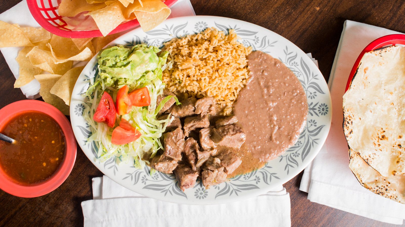 Order Carne Guisada Dinner food online from La Carreta Mexican Restaurant store, Houston on bringmethat.com
