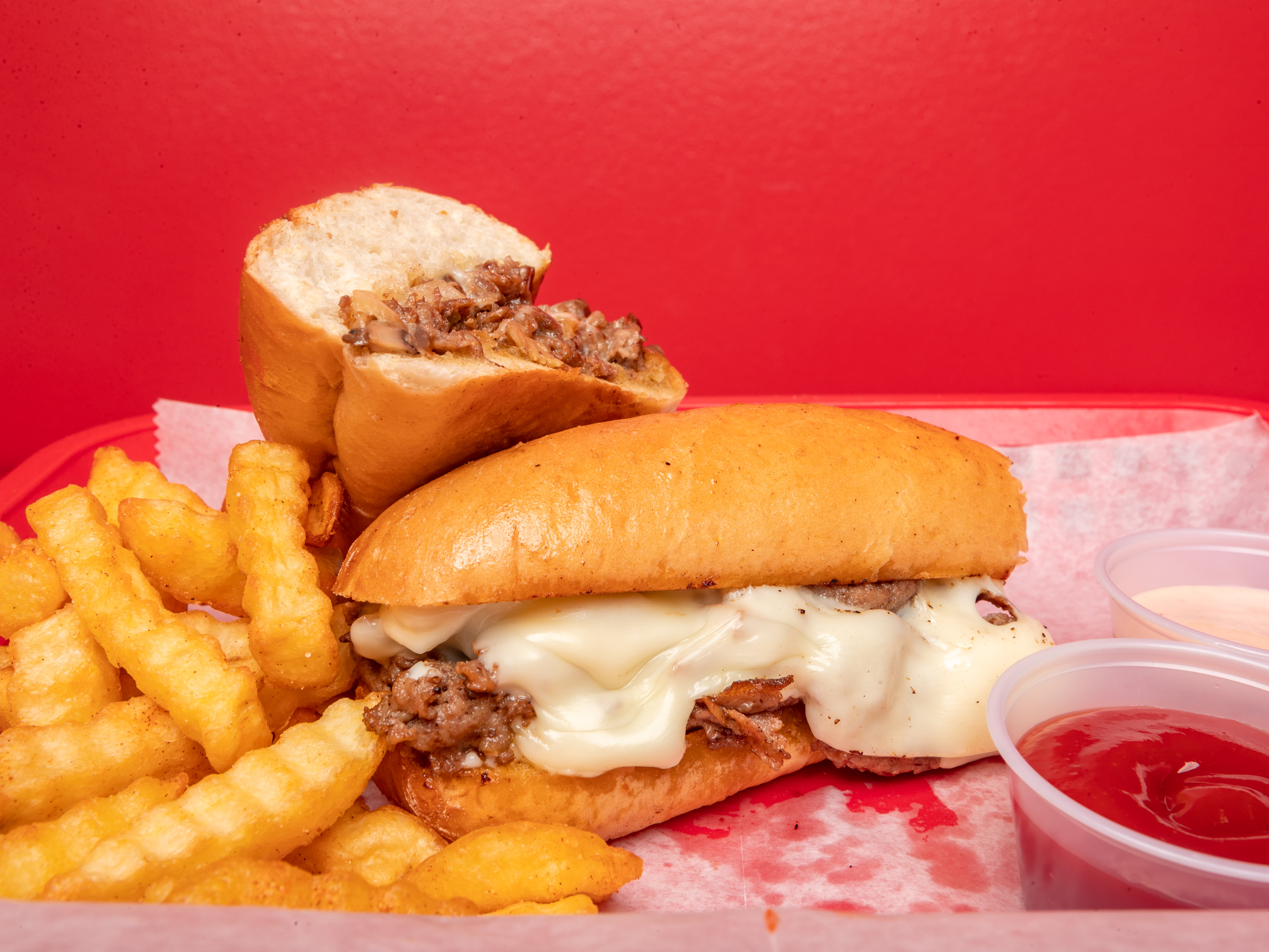Order 2. Philly Cheesesteak Combo food online from K Wings Cafe store, Lilburn on bringmethat.com