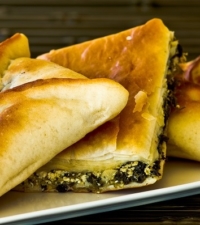Order Spinach Pie Al A Carte food online from Woody's Oasis store, East Lansing on bringmethat.com
