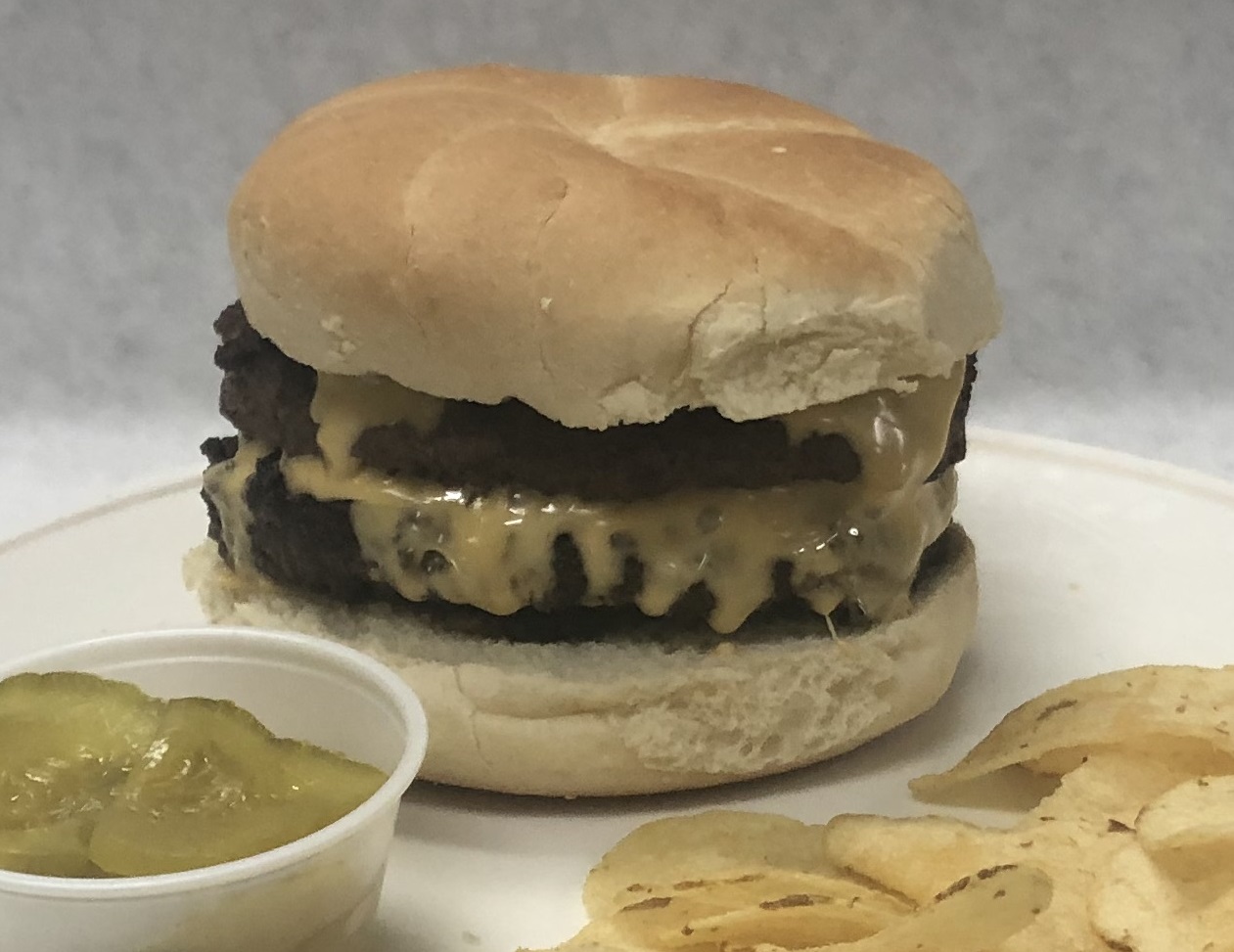Order Double Cheeseburger food online from Mellon Pub store, Mckeesport on bringmethat.com