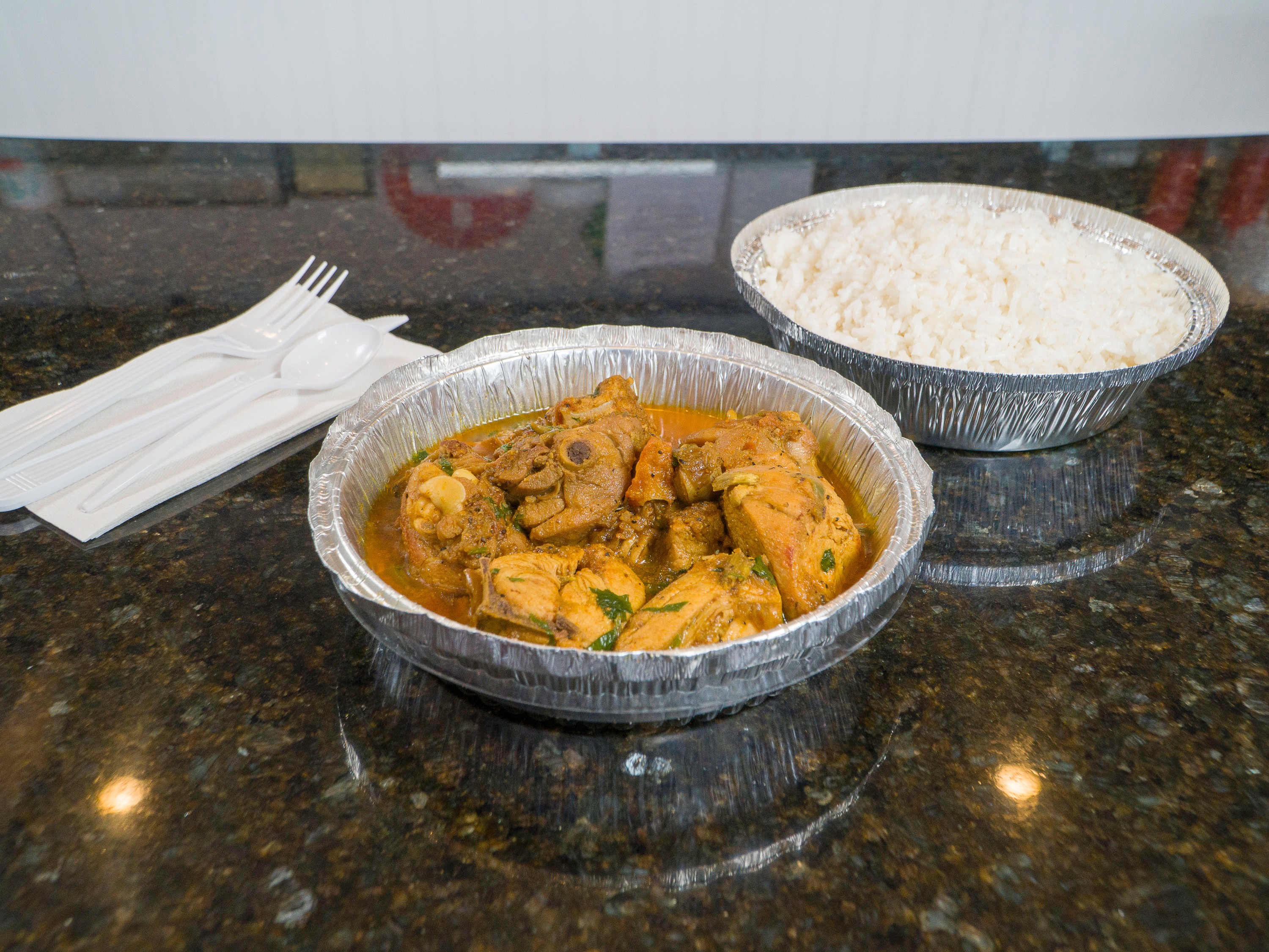Order Nepalese Chicken Curry food online from Papa Curry store, Arlington on bringmethat.com
