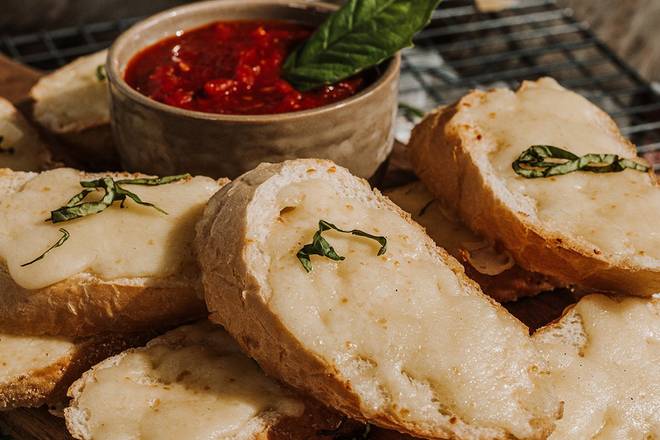 Order CHEESY GARLIC BREAD food online from Old Chicago store, Salina on bringmethat.com