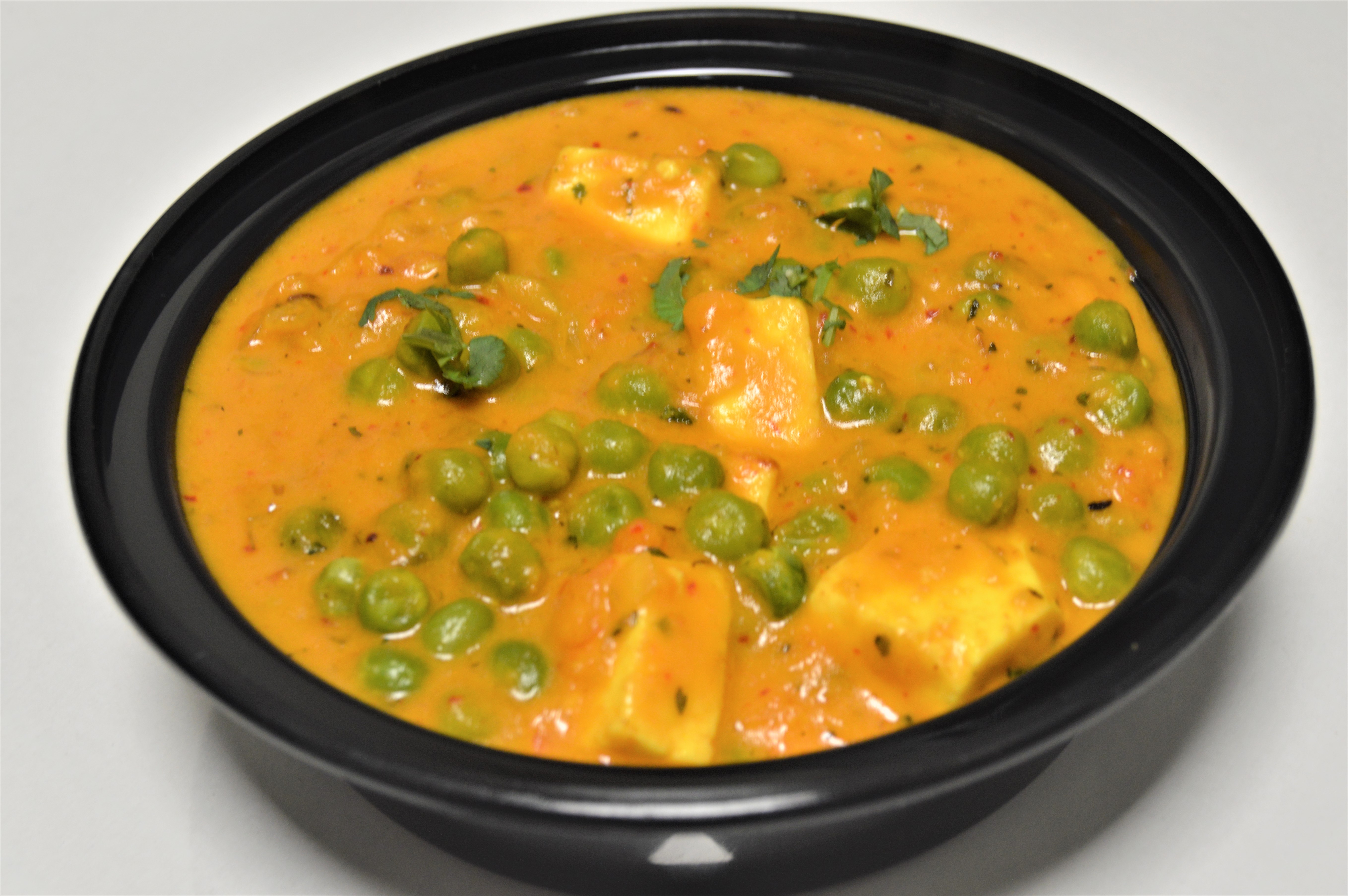 Order 62. Mutter Paneer food online from Salt And Pepper Grill Iii store, Washington on bringmethat.com