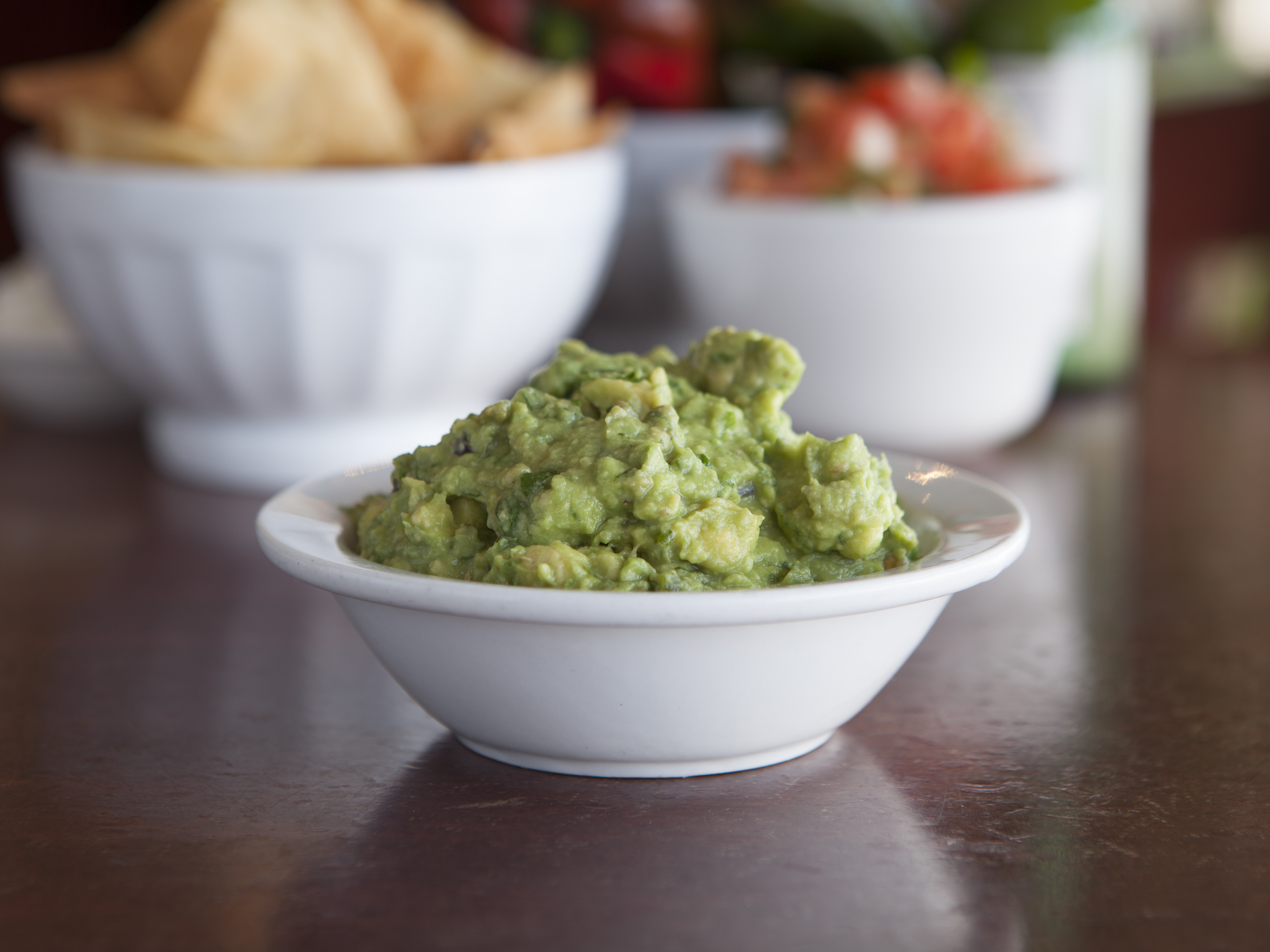 Order Guacamole for Dipping (8 oz.) food online from Street-Legal Burritos store, Santa Monica on bringmethat.com