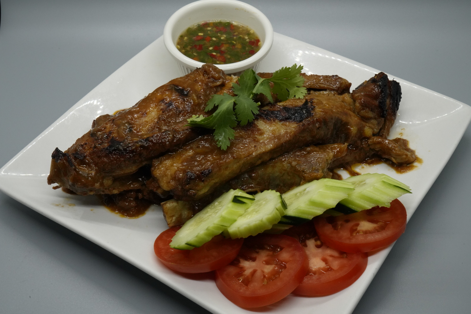Order 48. BBQ Pork Spare Ribs food online from Royal Orchid Thai Restaurant store, Riverside on bringmethat.com