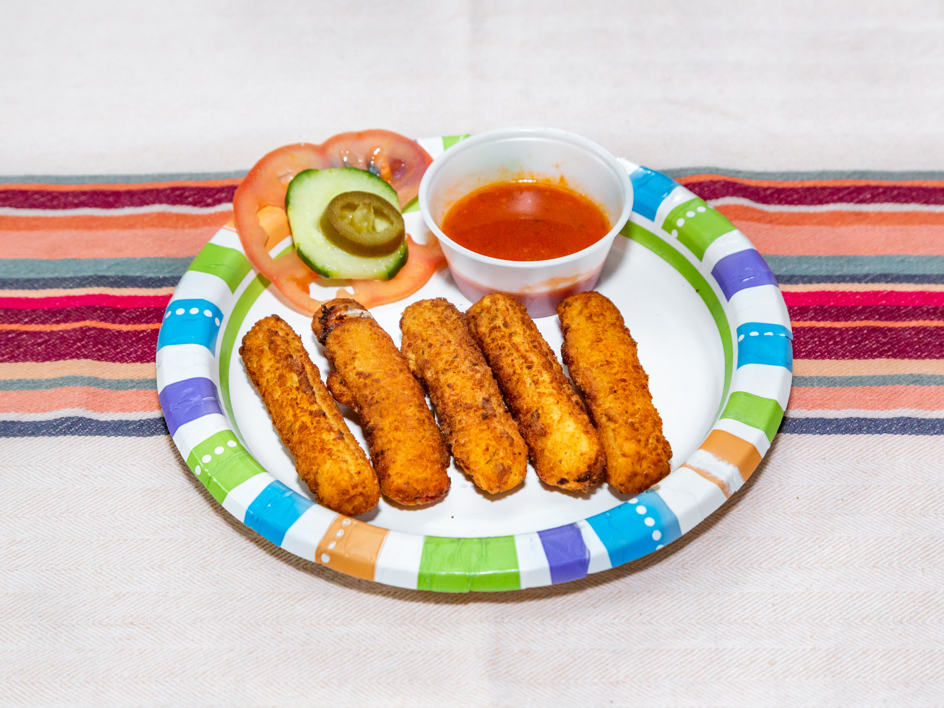 Order Mozzarella Sticks food online from Frelinghuysen Deli store, Newark on bringmethat.com