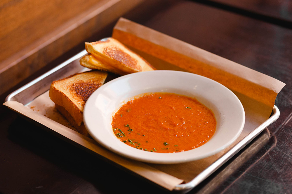 Order Tomato Bisque food online from Doc Crows Southern Smokehouse and Raw Bar store, Louisville on bringmethat.com