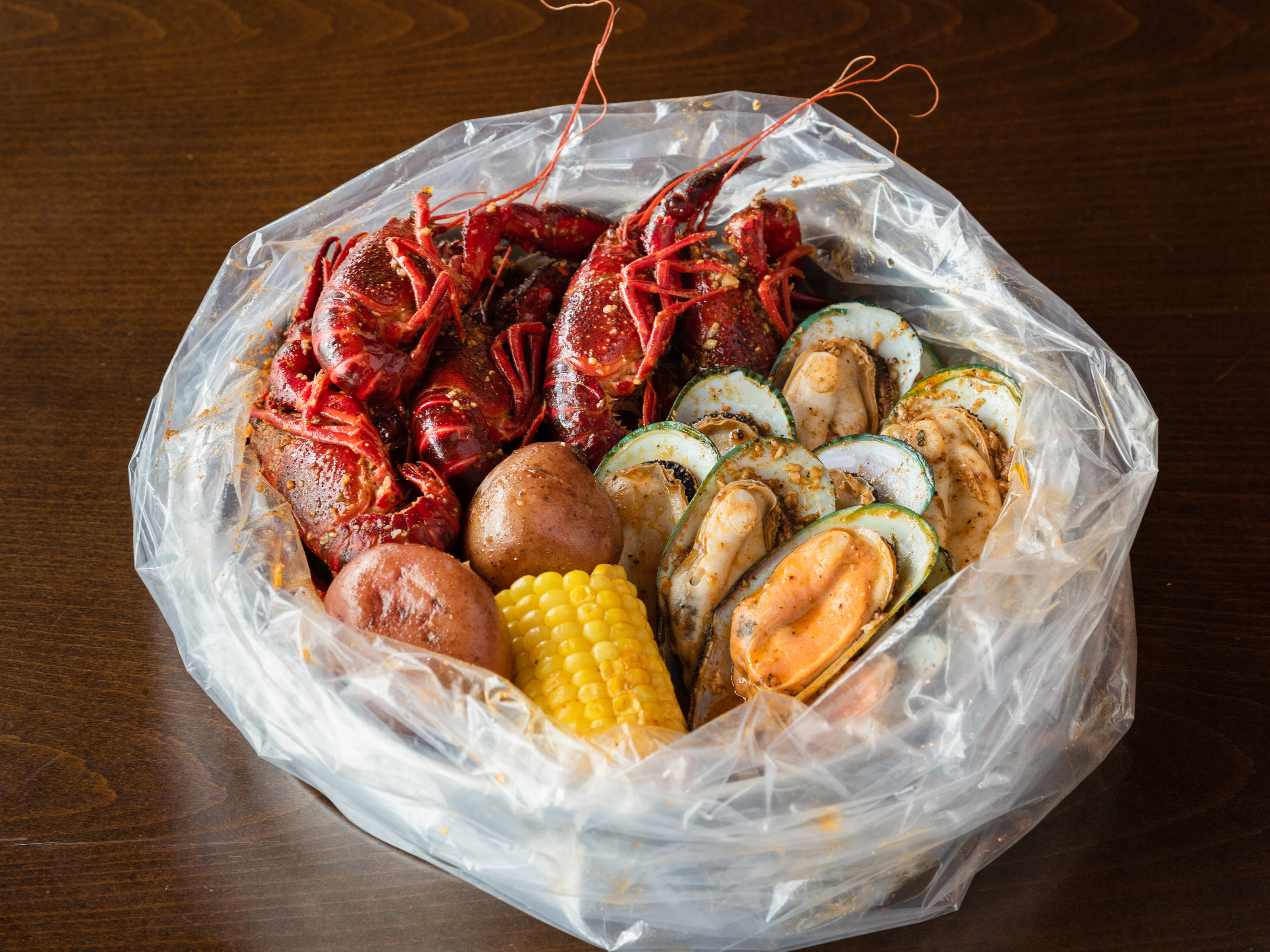 Order 1. Craw Fish and Mussel Combo food online from Shaking Seafood store, Roslindale on bringmethat.com