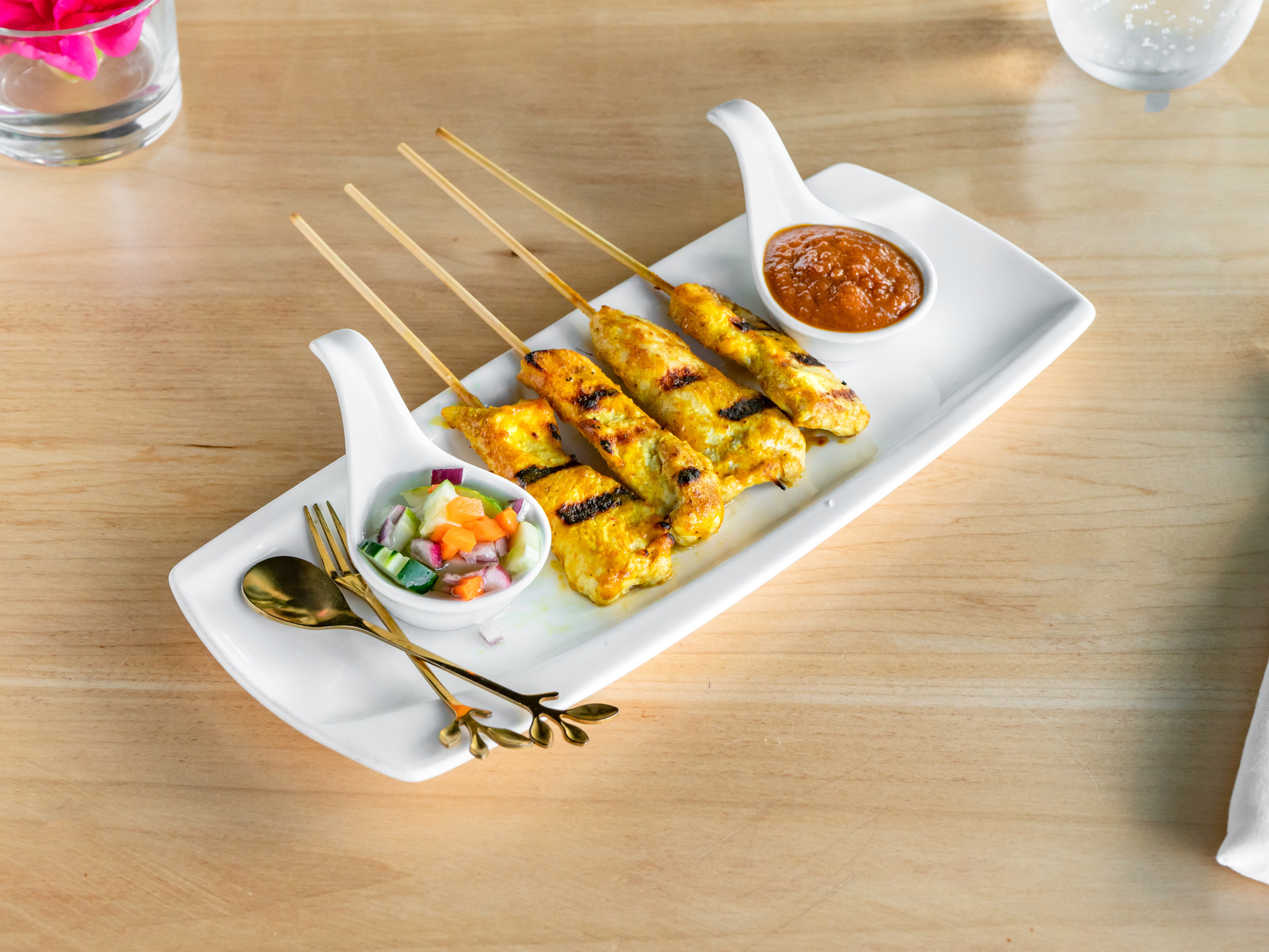 Order Chicken Satay food online from Sweet Lime Thai store, San Francisco on bringmethat.com