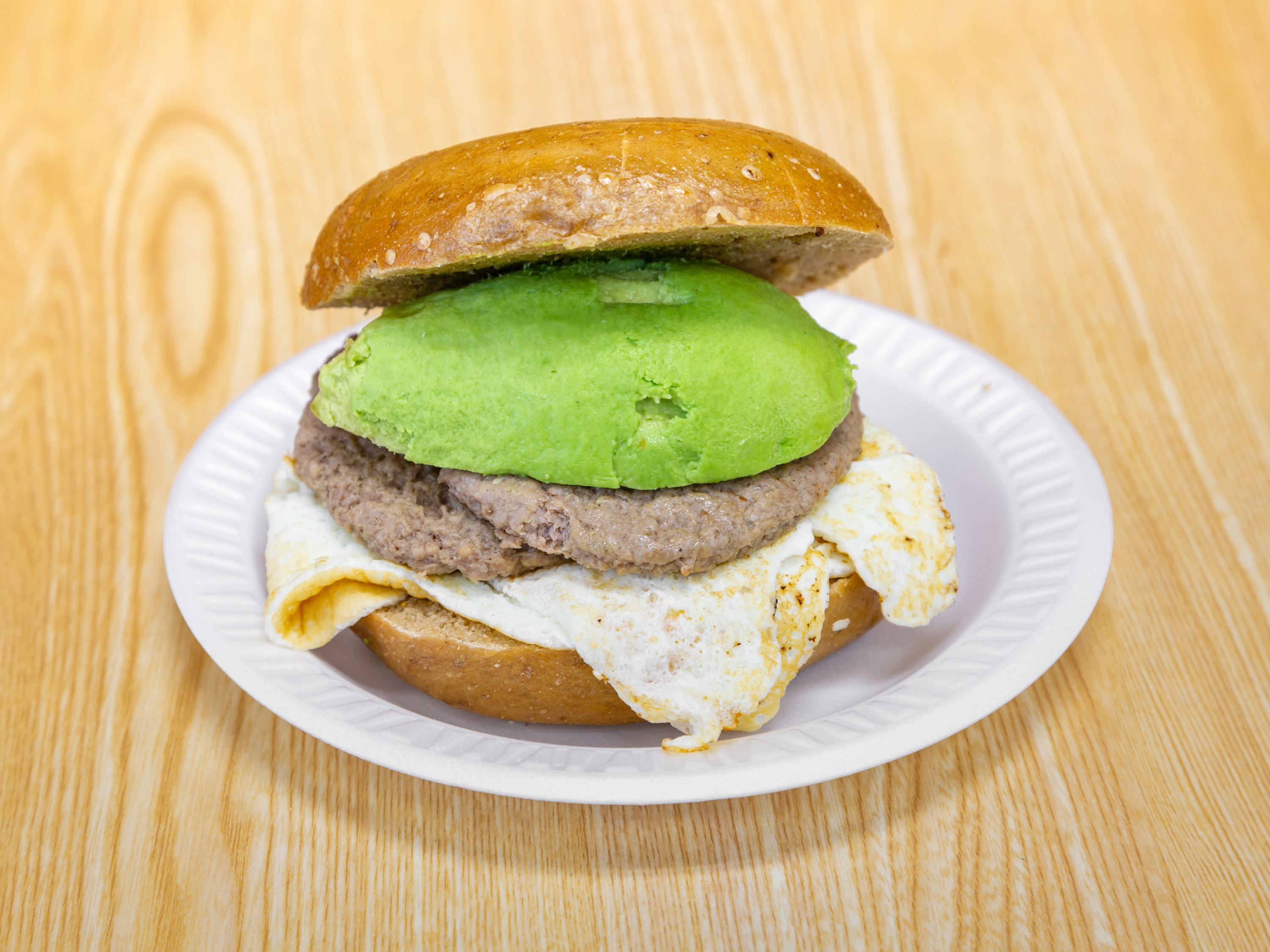 Order Egg Whites with Turkey Sausage and Avocado Sandwich food online from Bagel One store, East Brunswick on bringmethat.com