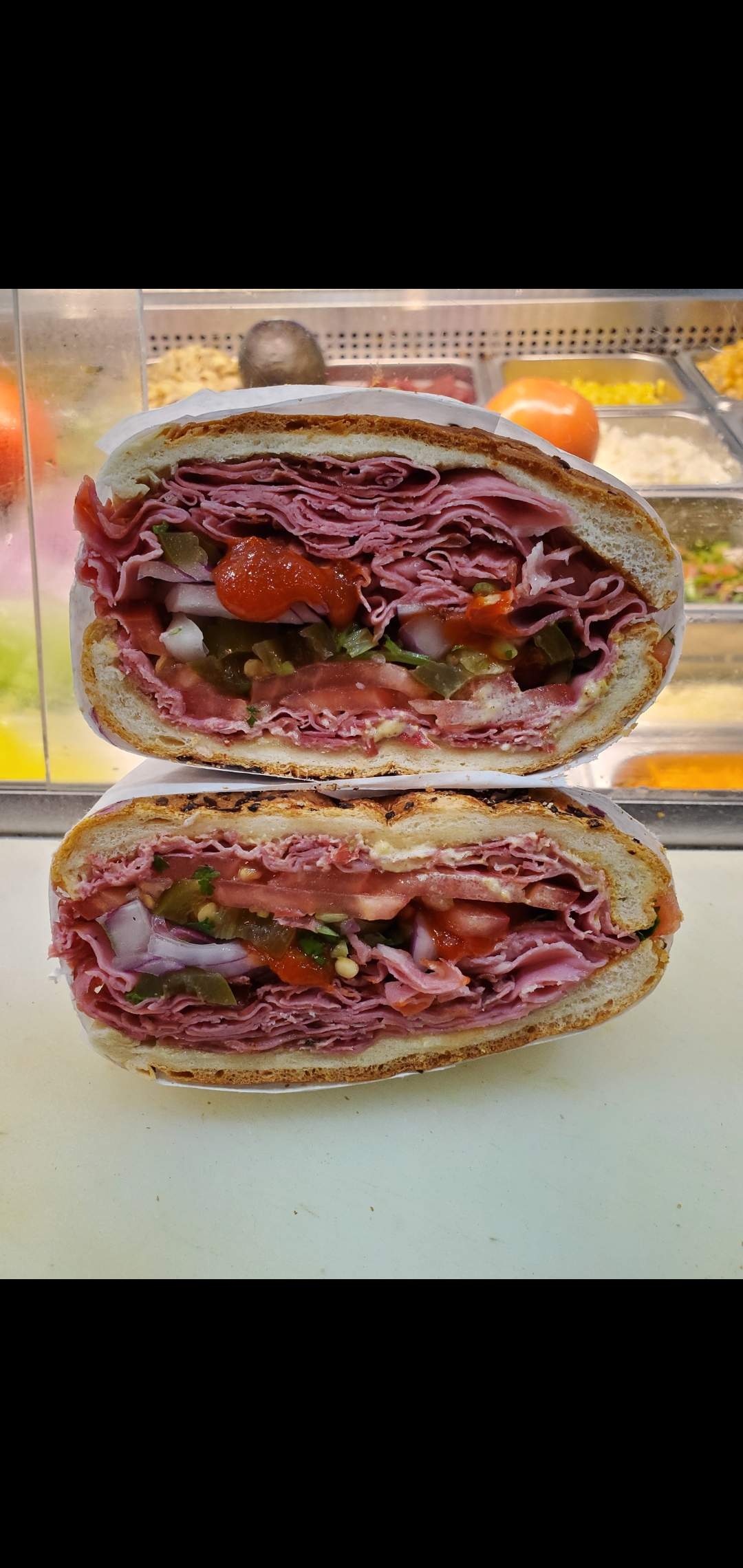 Order Boar's Head Hot Pastrami Special Sandwich (pastrami melted cheese ettuce tomatoes jalapeños) food online from American Gourmet Foods Deli store, New York on bringmethat.com