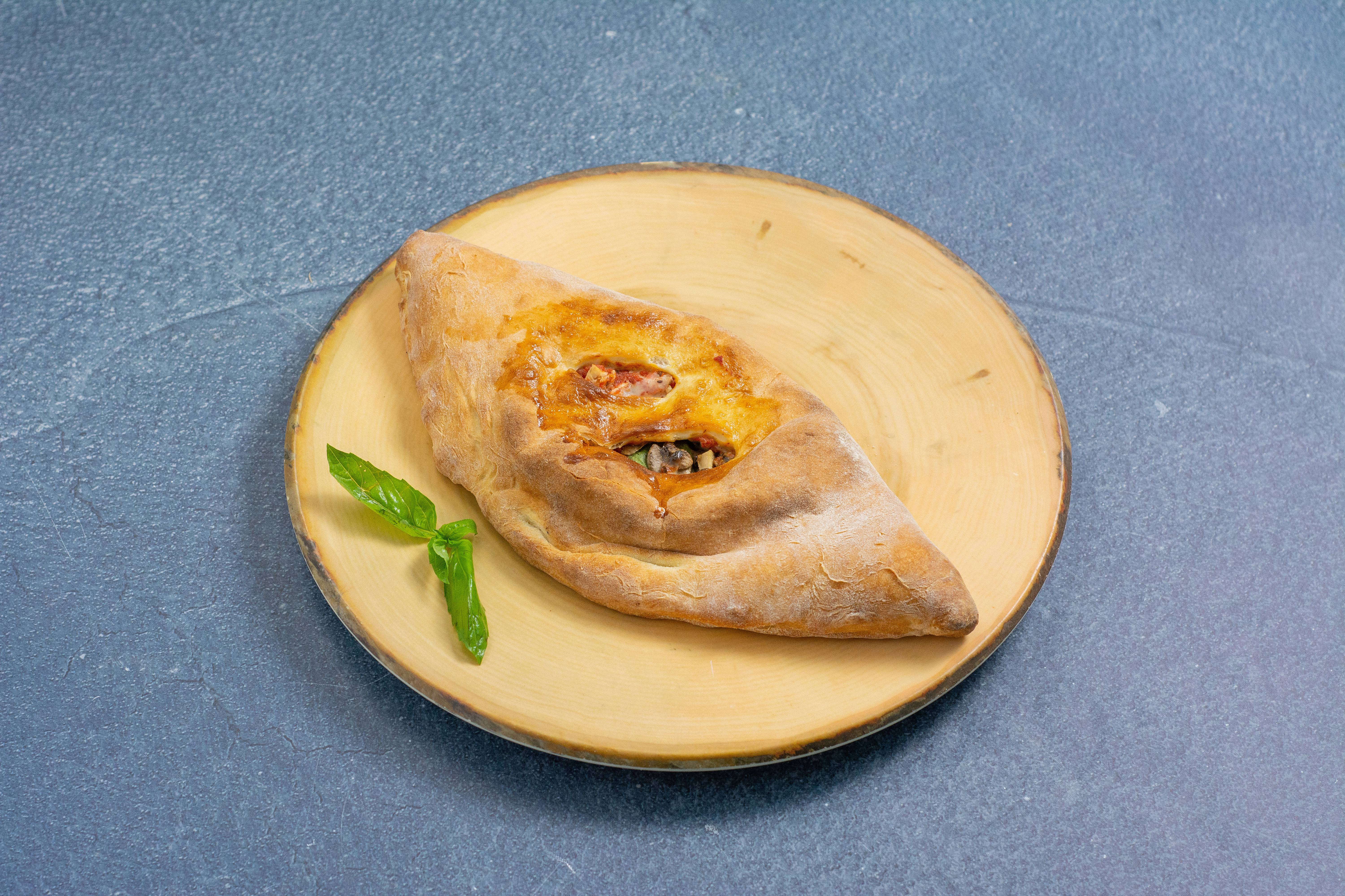 Order Chicken Calzone food online from Gumba's store, Sunnyvale on bringmethat.com