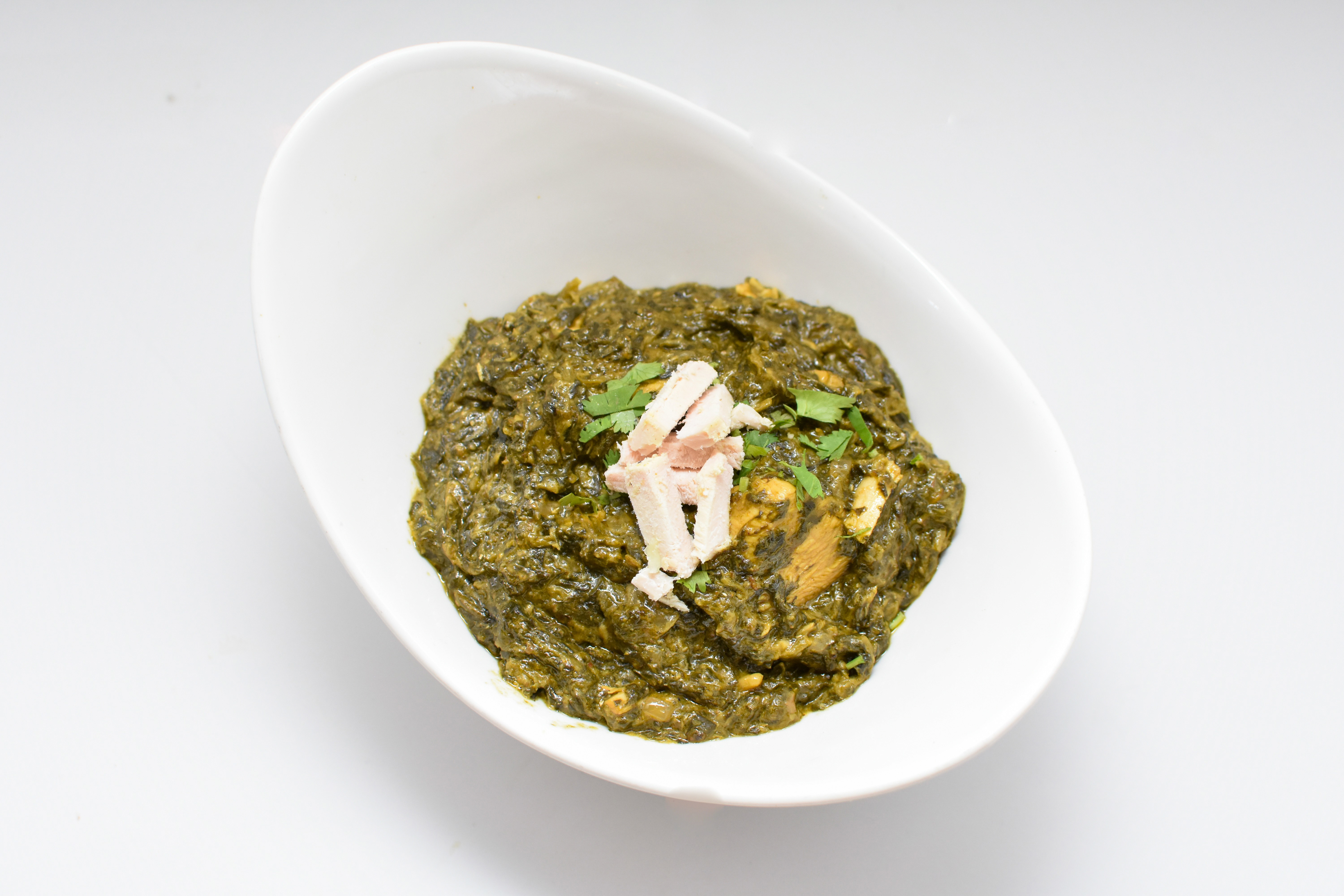 Order Chicken Saag food online from Sher-A-Punjab store, Quincy on bringmethat.com