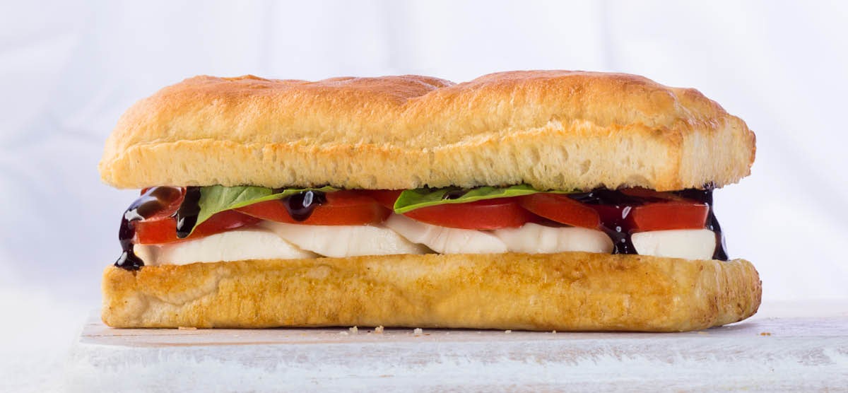 Order Caprese food online from Earl Of Sandwich store, Tampa on bringmethat.com