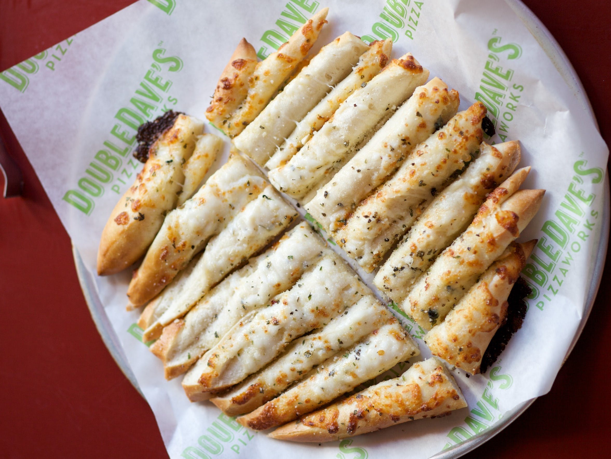 Order Cheesesticks - Appetizer food online from DoubleDave's Pizzaworks store, Houston on bringmethat.com