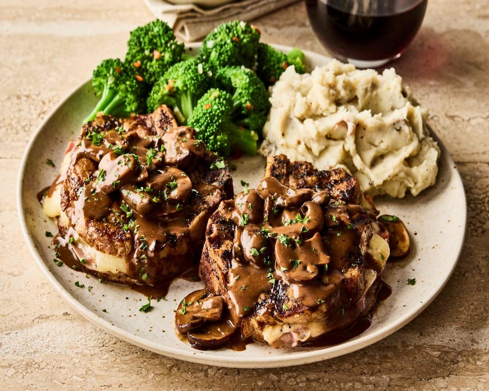Order NEW!  Fontina and Prosciutto-Stuffed Pork Chops* food online from Carrabba store, Reston on bringmethat.com