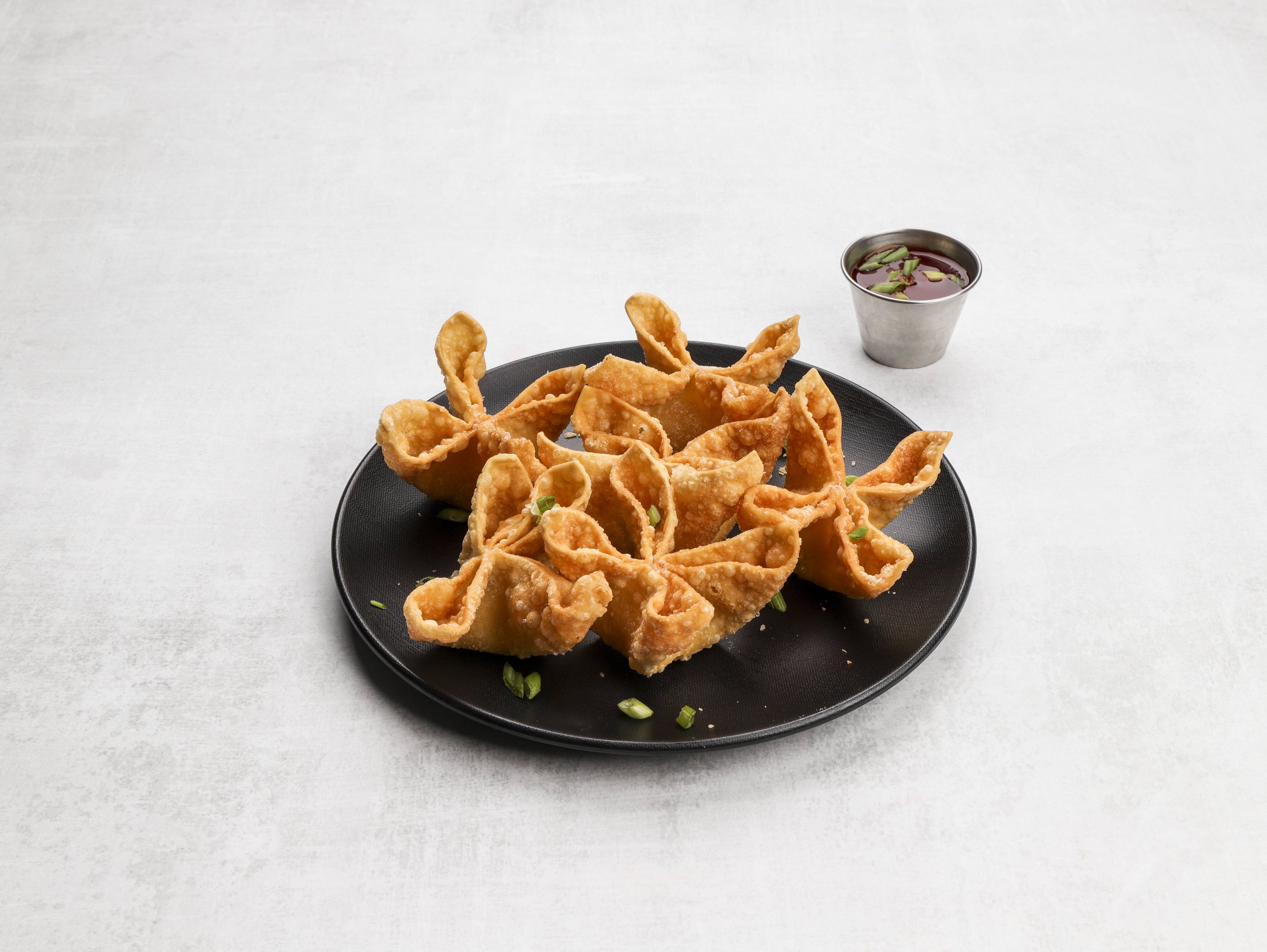 Order 10. Crab Rangoon food online from Szechuan House store, Lawrence on bringmethat.com