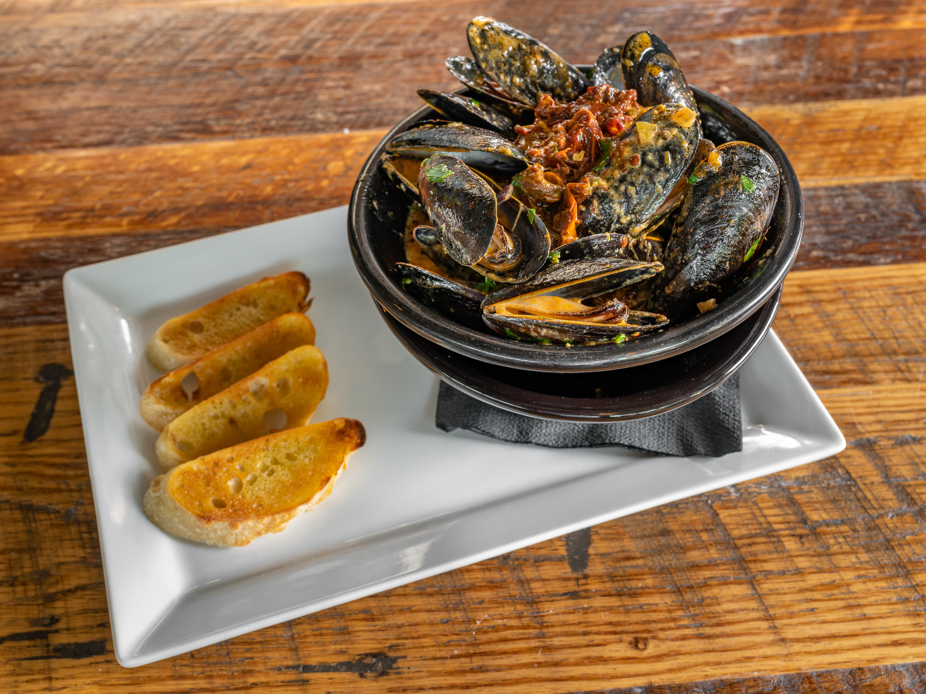 Order Spicy Steamed Mussels food online from Burger Bach store, Richmond on bringmethat.com