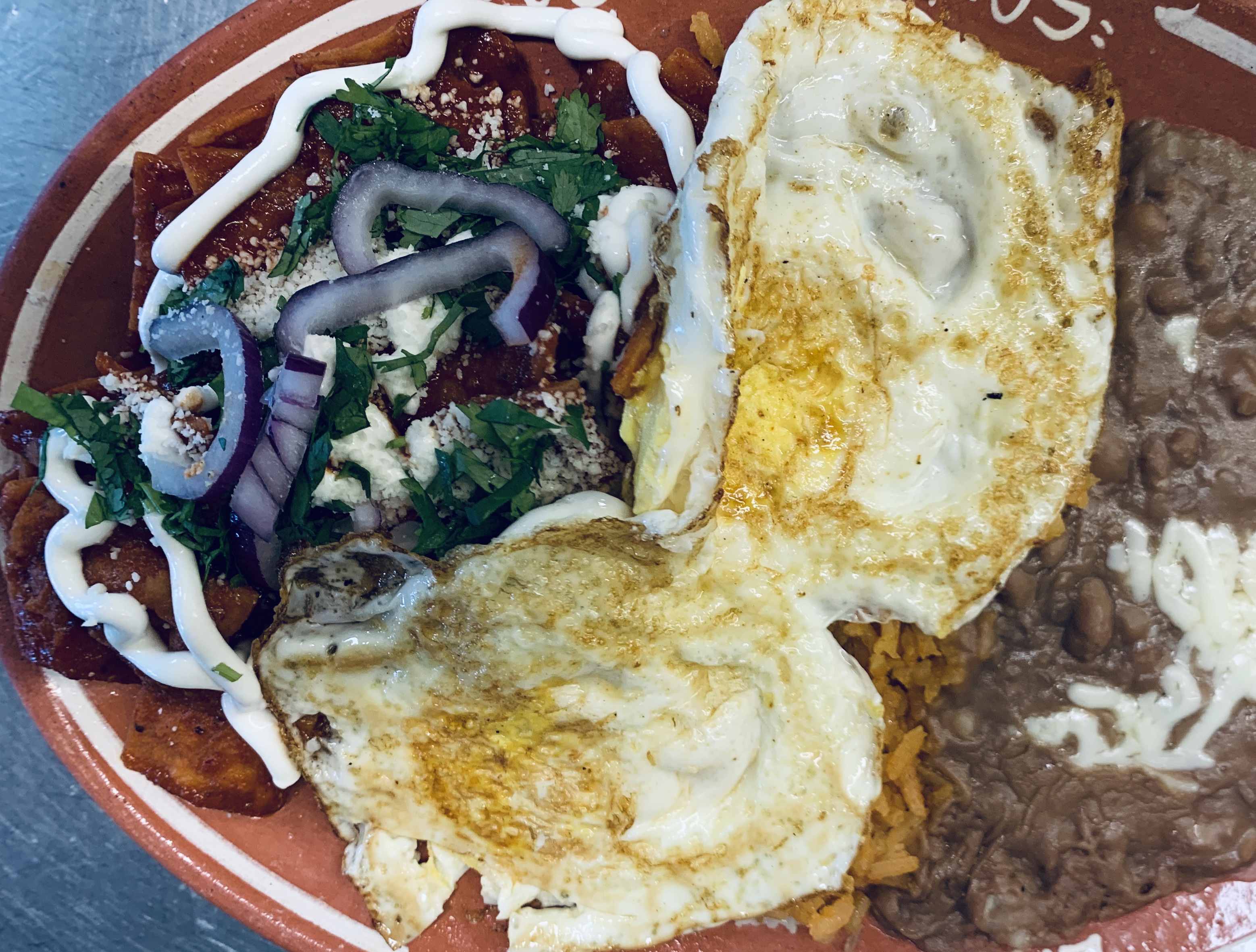 Order 45. Chilaquiles food online from Las Cazuelas Restaurant store, San Jose on bringmethat.com