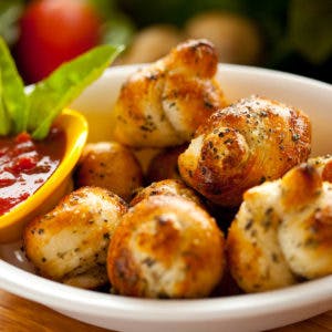 Order Garlic Knots with Cheese - 5 Pieces food online from The Garlic Knot store, Aurora on bringmethat.com