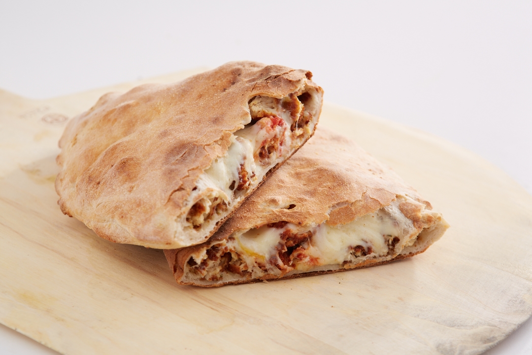 Order Chicken Parmesan Calzone food online from Sal Pizza store, Manchester on bringmethat.com
