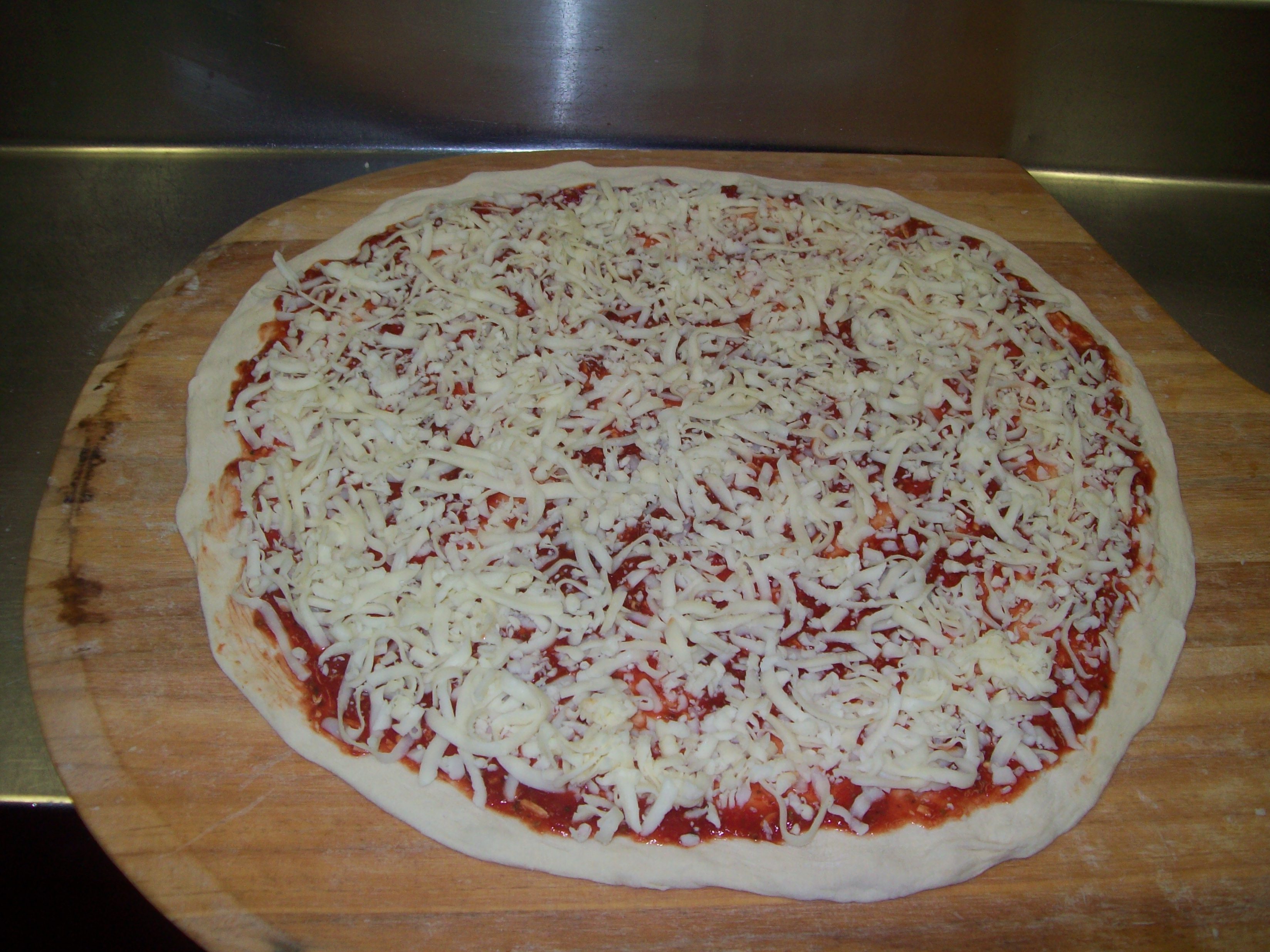 Order Just Cheese Pizza food online from Rinaldi Pizza & Sub Shop store, Marne on bringmethat.com